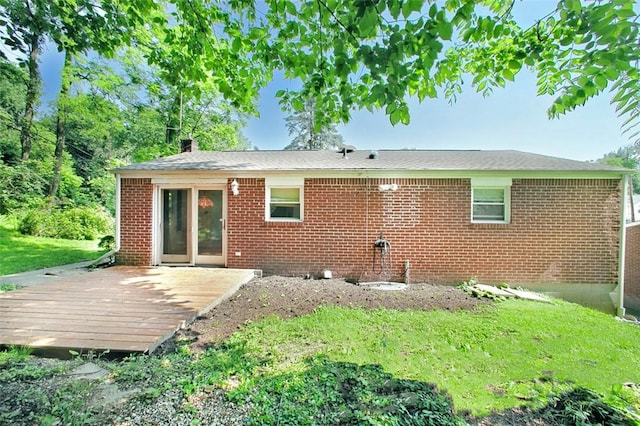 504 N St, Baldwin Boro, PA 15227 - back of house with brick siding, a wooden deck, a chimney, and a yard