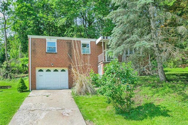 504 N St, Baldwin Boro, PA 15227 - view of front of home with driveway, a garage, brick siding, and a front yard