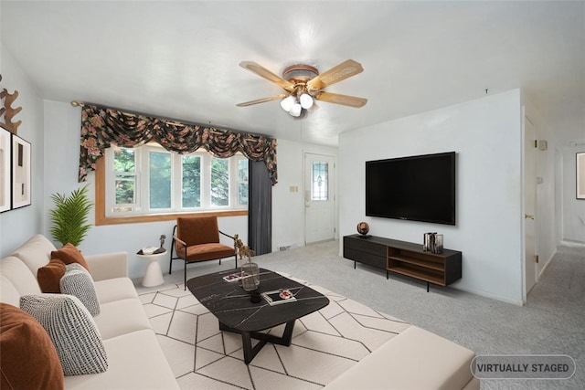504 N St, Baldwin Boro, PA 15227 - living room featuring a ceiling fan and light colored carpet
