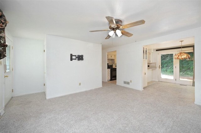 504 N St, Baldwin Boro, PA 15227 - unfurnished living room featuring carpet floors, ceiling fan, and baseboards