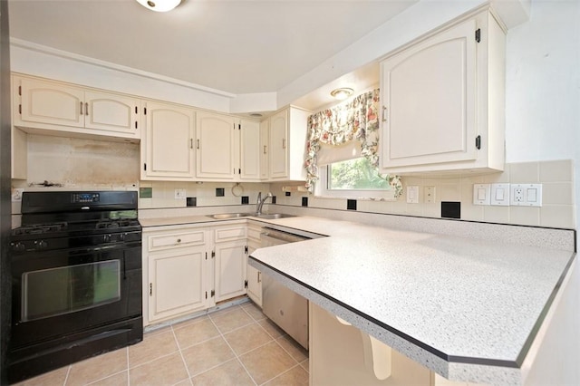 504 N St, Baldwin Boro, PA 15227 - kitchen featuring black range with gas stovetop, a sink, stainless steel dishwasher, a peninsula, and light countertops