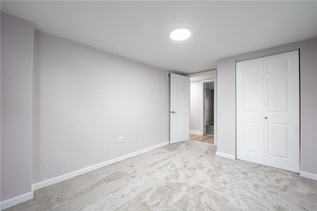 1200 Wood St, Derry Twp, PA 15650 - unfurnished bedroom featuring carpet flooring, baseboards, and a closet