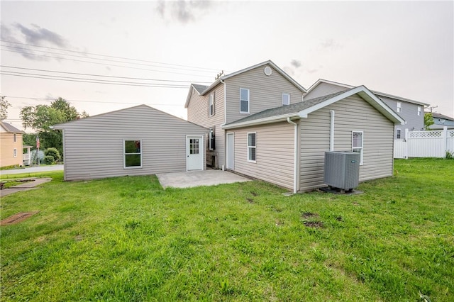 1200 Wood St, Derry Twp, PA 15650 - rear view of property featuring central air condition unit and a patio