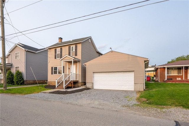 1200 Wood St, Derry Twp, PA 15650 - view of front facade featuring a front yard, driveway, an attached garage, and a chimney