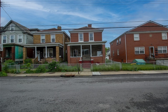 202 Jane St, Mckees Rocks, PA 15136 - view of front of home featuring a fenced front yard and brick siding