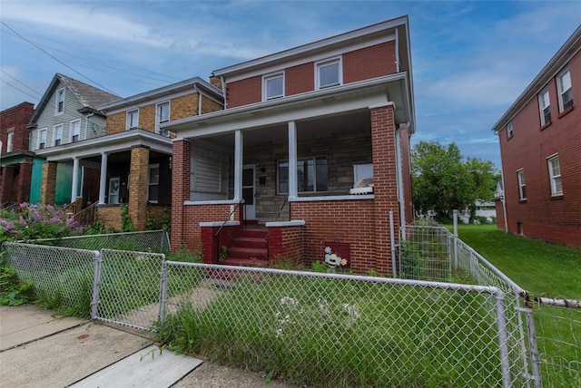 202 Jane St, Mckees Rocks, PA 15136 - view of front of house featuring brick siding, a porch, and a gate