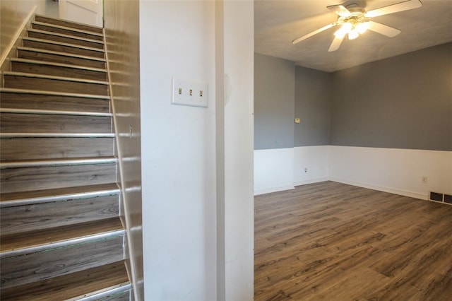 202 Jane St, Mckees Rocks, PA 15136 - stairway with a ceiling fan, wood finished floors, and baseboards