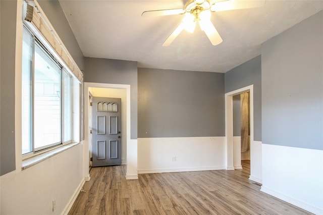 202 Jane St, Mckees Rocks, PA 15136 - spare room with wood finished floors, a ceiling fan, and baseboards