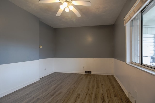 202 Jane St, Mckees Rocks, PA 15136 - spare room featuring wood finished floors, ceiling fan, and baseboards