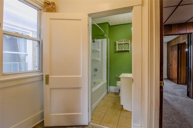 202 Jane St, Mckees Rocks, PA 15136 - bathroom featuring toilet,  shower combination, and tile patterned flooring