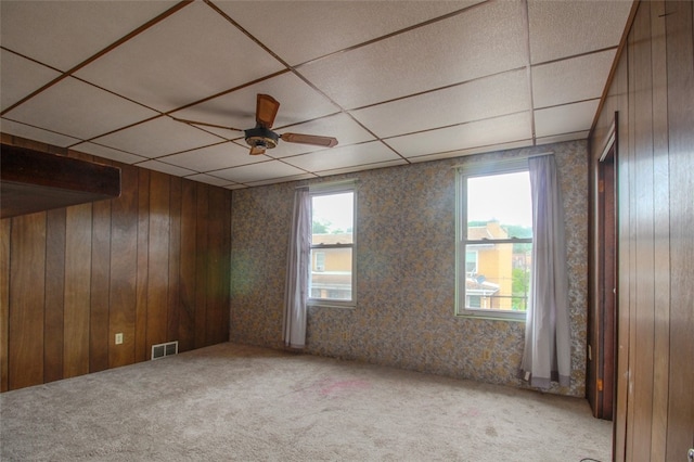 202 Jane St, Mckees Rocks, PA 15136 - spare room with carpet floors, a paneled ceiling, and wallpapered walls