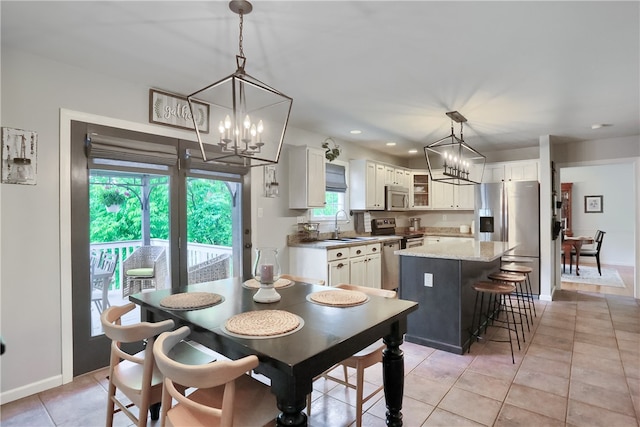 814 Graywyck Dr, Seven Fields Boro, PA 16046 - dining area featuring a chandelier, light tile patterned flooring, recessed lighting, and baseboards