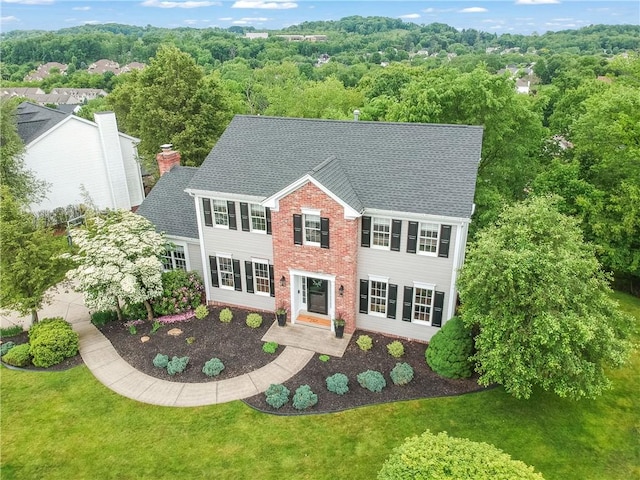 814 Graywyck Dr, Seven Fields Boro, PA 16046 - colonial-style house with roof with shingles, brick siding, and a front lawn