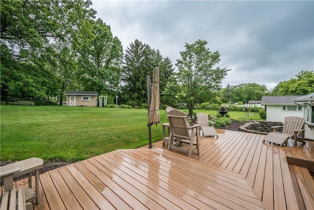 322 Franklin Dr, Peters Twp, PA 15241 - deck with a lawn, an outdoor structure, and view of wooded area