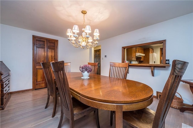 322 Franklin Dr, Peters Twp, PA 15241 - dining space featuring light wood finished floors, a chandelier, and baseboards