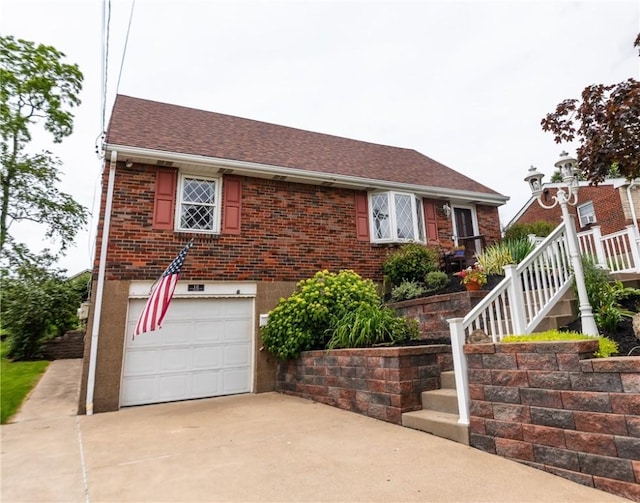 10 Claireview Dr, Scott Twp Sal, PA 15106 - view of front facade with an attached garage, brick siding, driveway, and roof with shingles