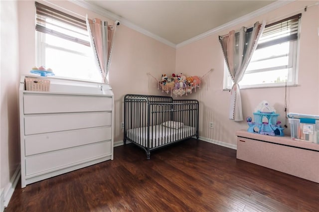 10 Claireview Dr, Carnegie, PA 15106 - bedroom featuring ornamental molding, multiple windows, wood finished floors, and a crib