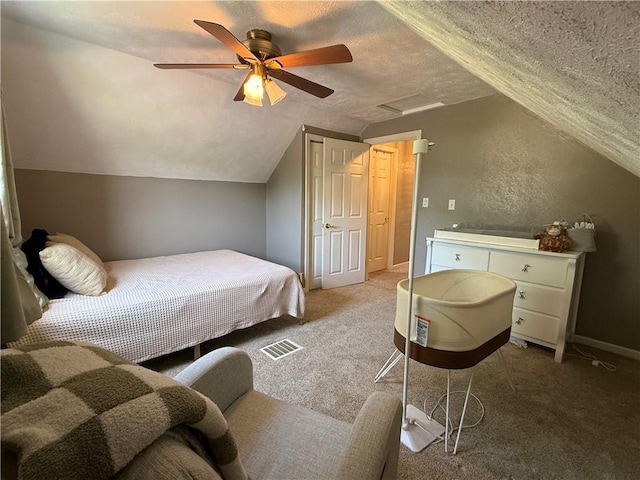 10 Claireview Dr, Carnegie, PA 15106 - bedroom featuring lofted ceiling, a textured ceiling, light colored carpet, and a ceiling fan