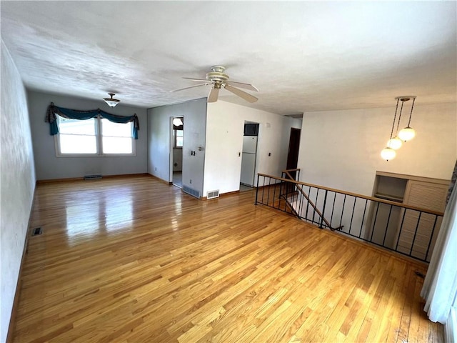 501 Clarendon St, Ohara, PA 15238 - unfurnished room featuring light wood-type flooring, a ceiling fan, and baseboards