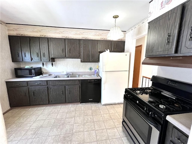 501 Clarendon St, Ohara, PA 15238 - kitchen featuring black appliances, a sink, light countertops, light floors, and under cabinet range hood