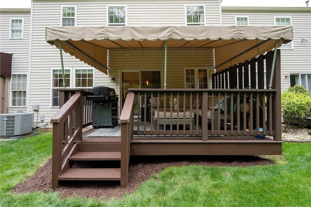 113 Unity Sq, Unity Twp, PA 15601 - rear view of property featuring central AC unit and a wooden deck