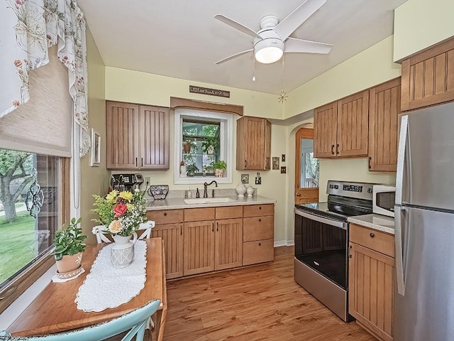 118 Judith Dr, Peters Twp, PA 15367 - kitchen featuring stainless steel appliances, a sink, a ceiling fan, and light countertops
