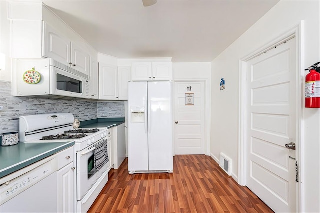 2216 Keystone Ave, Hempfield Twp Wml, PA 15601 - kitchen with white appliances, light wood-style flooring, white cabinets, backsplash, and baseboards