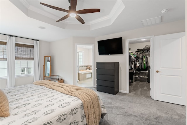 3035 Brookstone Dr, Cecil, PA 15317 - bedroom featuring a walk in closet, a raised ceiling, light colored carpet, ornamental molding, and a closet