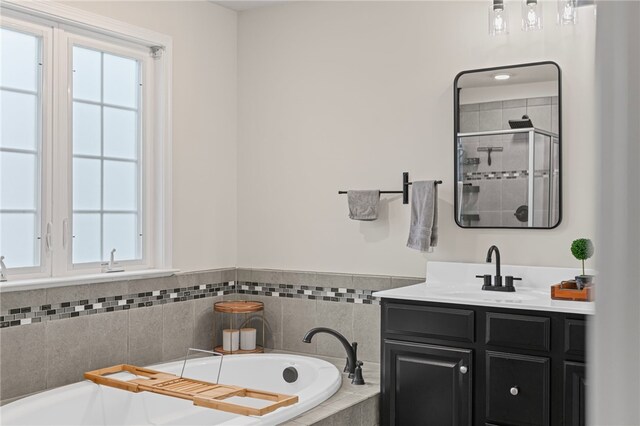 3035 Brookstone Dr, Cecil, PA 15317 - full bath featuring vanity, a garden tub, and a stall shower
