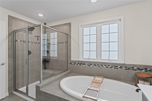 3035 Brookstone Dr, Cecil, PA 15317 - bathroom with a stall shower, a bath, and recessed lighting