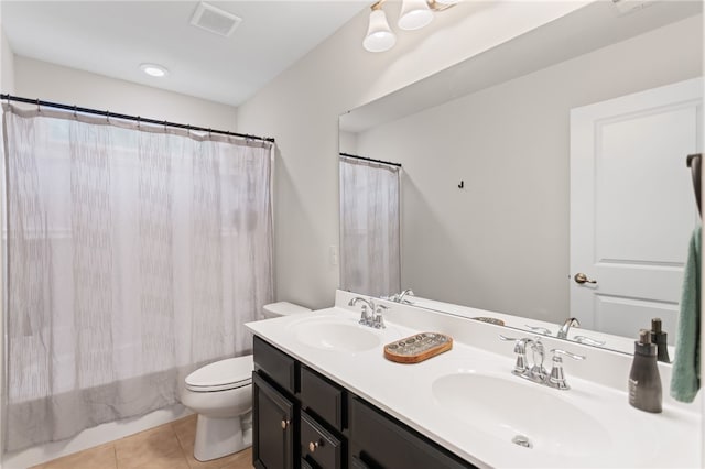 3035 Brookstone Dr, Cecil, PA 15317 - full bathroom featuring tile patterned flooring, toilet, and double vanity