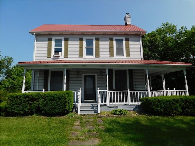 309 Mooney Ridge Rd, Waynsbrg/Frankln Twp, PA 15370 - farmhouse inspired home featuring a chimney, metal roof, covered porch, cooling unit, and a front yard
