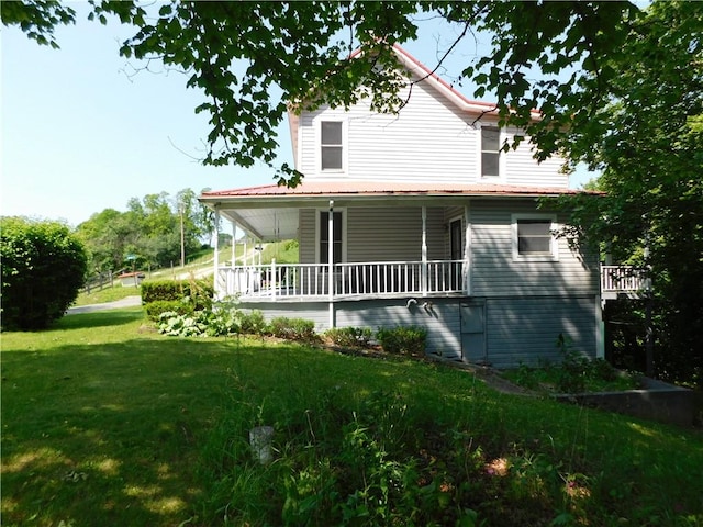 309 Mooney Ridge Rd, Waynsbrg/Frankln Twp, PA 15370 - country-style home with covered porch and a front yard