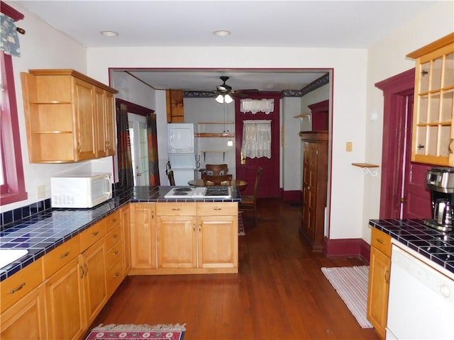 309 Mooney Ridge Rd, Waynsbrg/Frankln Twp, PA 15370 - kitchen with white appliances, tile counters, stacked washer / drying machine, a ceiling fan, and recessed lighting