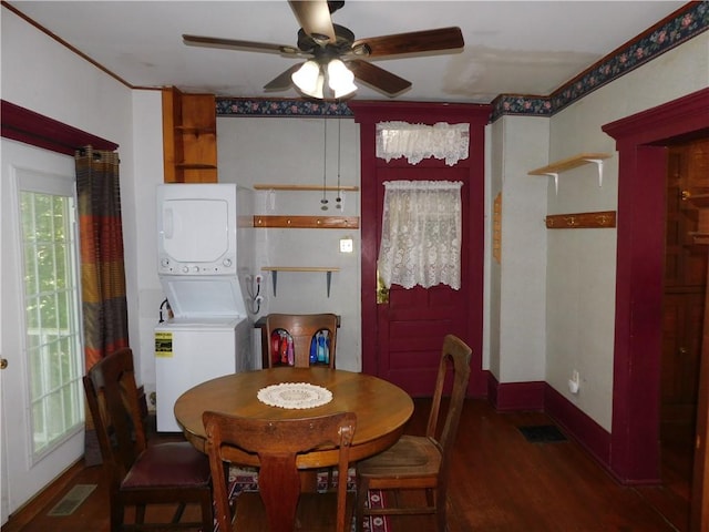 309 Mooney Ridge Rd, Waynsbrg/Frankln Twp, PA 15370 - dining room with stacked washing machine and dryer, ceiling fan, and wood finished floors