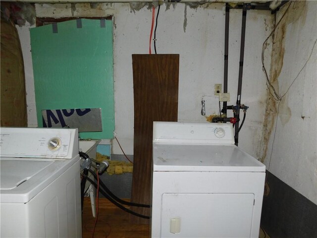 309 Mooney Ridge Rd, Waynsbrg/Frankln Twp, PA 15370 - laundry room with separate washer and dryer and wood finished floors