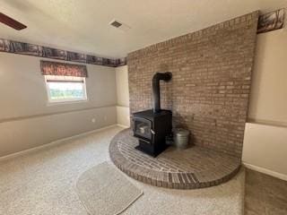 142 Poorbaugh Rd, Bullskin Twp, PA 15425 - detailed view of baseboards and a wood stove