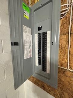 142 Poorbaugh Rd, Bullskin Twp, PA 15425 - utility room featuring electric panel