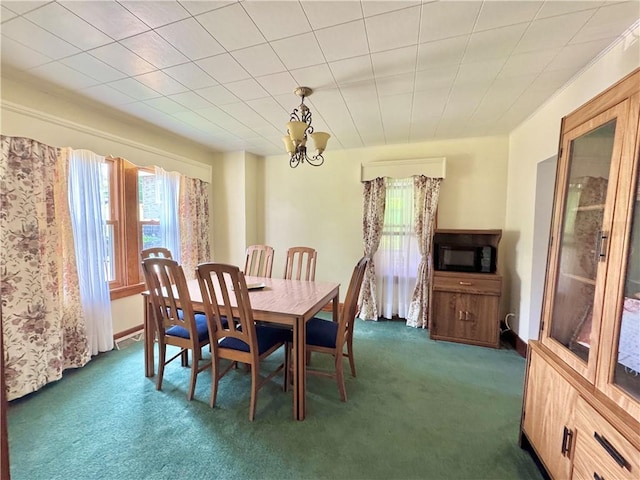 4404 Hollow Rd, Shenango Twp Law, PA 16101 - dining room featuring dark carpet and a chandelier