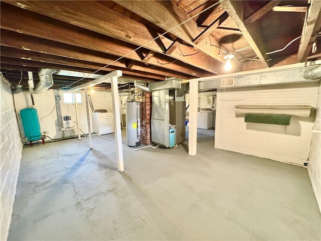 4404 Hollow Rd, Shenango Twp Law, PA 16101 - basement featuring water heater, a water pressure tank, heating unit, and washer and clothes dryer