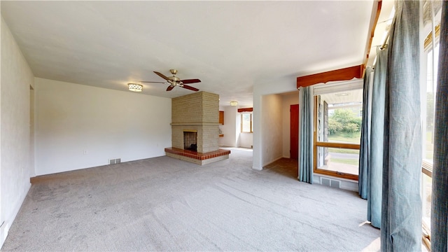 721 Herman Rd, Summit Twp But, PA 16002 - unfurnished living room with a ceiling fan, carpet floors, and a fireplace