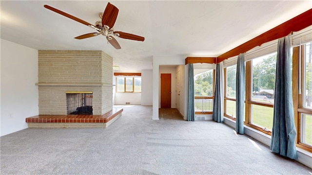 721 Herman Rd, Summit Twp But, PA 16002 - unfurnished living room featuring carpet, healthy amount of natural light, and a ceiling fan