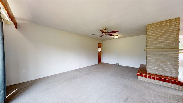 721 Herman Rd, Summit Twp But, PA 16002 - unfurnished living room with carpet flooring, ceiling fan, and a multi sided fireplace