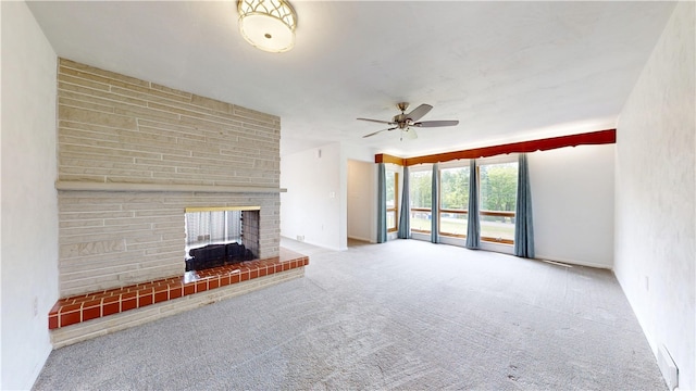 721 Herman Rd, Summit Twp But, PA 16002 - unfurnished living room featuring a ceiling fan, carpet, and a brick fireplace