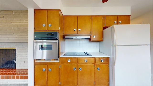721 Herman Rd, Summit Twp But, PA 16002 - kitchen featuring oven, freestanding refrigerator, black electric stovetop, extractor fan, and brown cabinetry