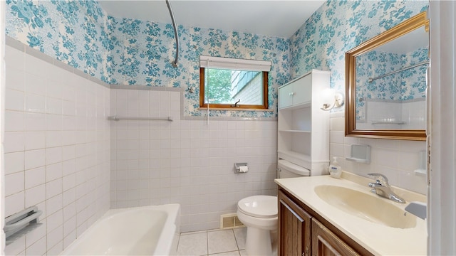 721 Herman Rd, Summit Twp But, PA 16002 - full bath featuring wallpapered walls, tile walls, toilet, tile patterned floors, and vanity