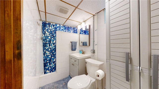 721 Herman Rd, Summit Twp But, PA 16002 - bathroom with toilet, curtained shower, a paneled ceiling, and vanity
