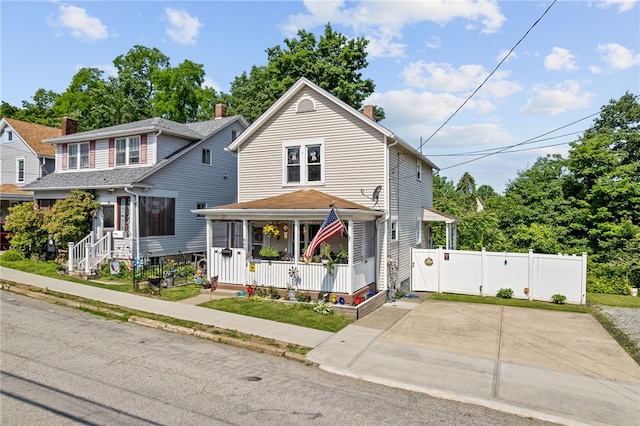 800 Romine Ave, Port Vue, PA 15133 - view of front facade with a gate and a chimney