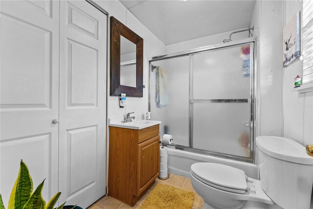 800 Romine Ave, Port Vue, PA 15133 - full bathroom featuring toilet, vanity, combined bath / shower with glass door, and tile patterned floors