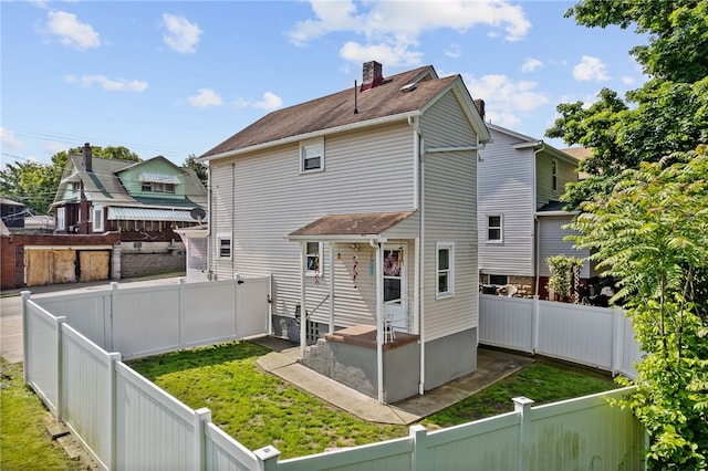 800 Romine Ave, Port Vue, PA 15133 - back of property with a chimney and a shingled roof